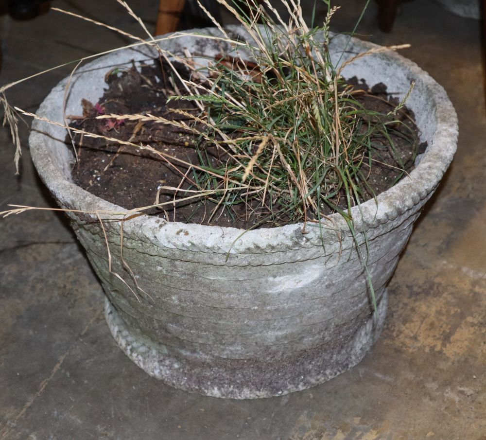 A pair of circular reconstituted stone garden planters, diameter 45cm